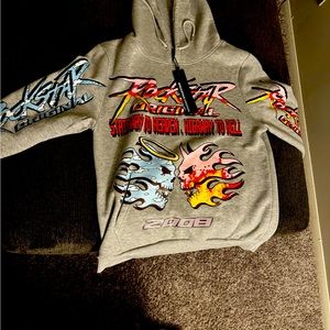 Brand new men’s sweatsuit with tags size large with design